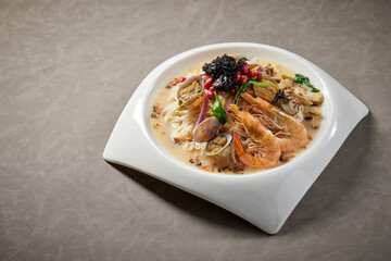 traditional chinese set seafood fried putian noodle with dumpling dim sum bao and soup snack...