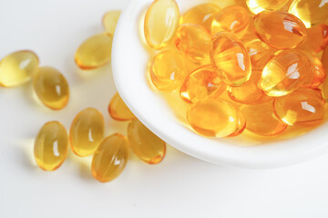 Fish oil or Cod liver oil gel in capsules with omega 3 vitamins, supplementary healthy food