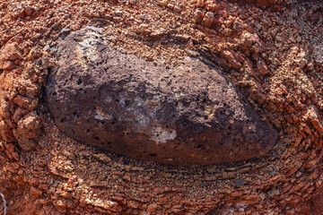 Spheroidal weathering basalt， Waimea Canyon Basalt / Napali Member / Lava flows, Kauai, Hawaii. Red soil. 