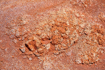 Spheroidal weathering basalt， Waimea Canyon Basalt / Napali Member / Lava flows, Kauai, Hawaii. Red soil. 