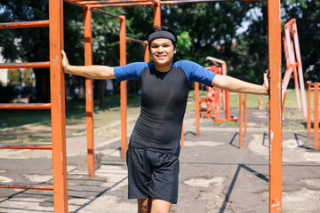 Confident Young Asian Sportsman Ready For Workout In Outdoor