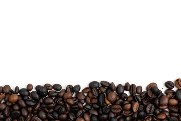 top view of pile of coffee as border or frame on bottom on white background