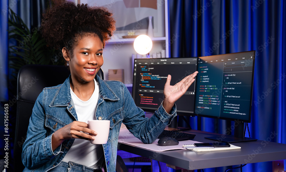 Poster young african wearing jeans shirt, it developer presenting program on computer screens displaying co