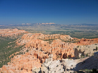 Bryce Canyon National Park surreal landscape with red rock hoodoos amphitheater view from Rim trail edge on Inspiration point
