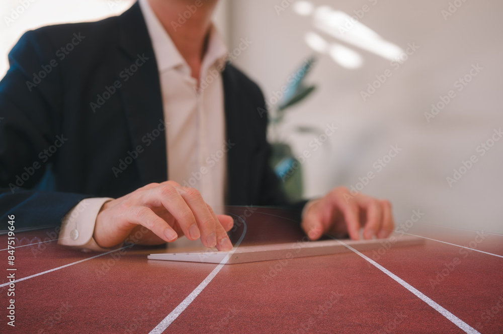 Poster multi exposure of running track and businessman typing on computer keyboard in concept of startup ma