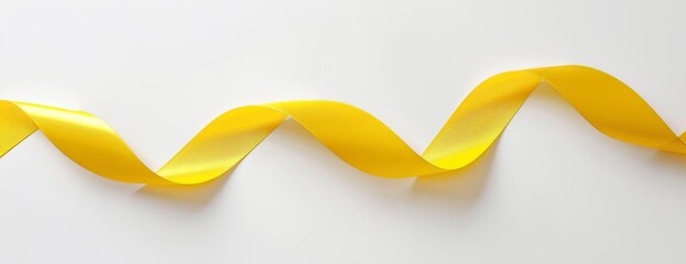 Fototapeta premium Bright yellow ribbon delicately floating in a long shot, framed by a stark white background, dedicated to endometriosis awareness, photorealism, smooth curves, minimalist design