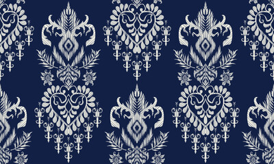 Hand draw Ethnic geometric fabric pattern .Ikat embroidery Ethnic oriental Pixel pattern blue background.great for background ,curtain, carpet, wallpaper, clothing, wrapping,batik