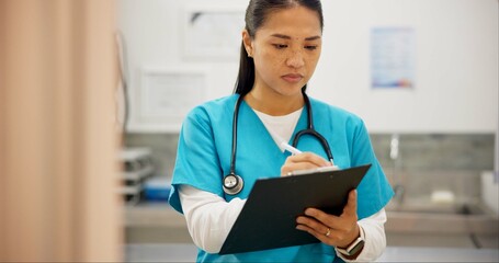 Asian woman, vet and writing with clipboard for results on animal medicine, study or diagnosis at...