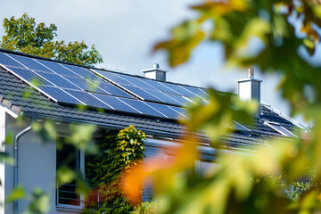 solar panels on a roof,  Close up of a new building with solar panels on the roof Sustainable and clean energy at home
