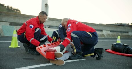 People, paramedic and help patient in road on scene for emergency, rescue and support. Emt team,...