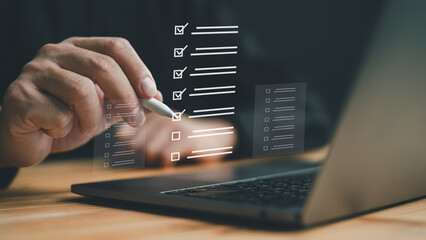 Business performance checklist, businessman doing online checklist survey, filling out digital form...