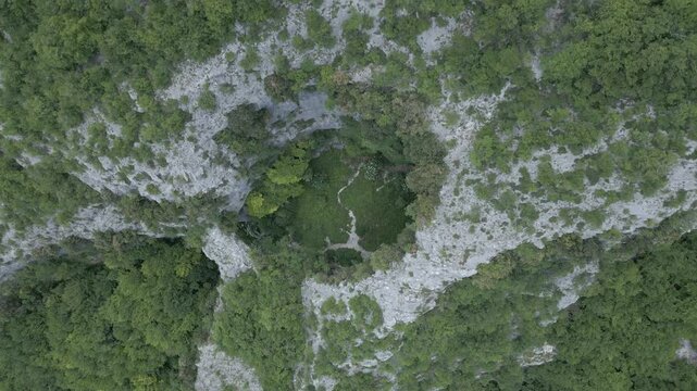 Stunning drone footage showcasing the breathtaking beauty of Italy's wild nature, featuring  forests, rugged landscapes, and untouched wilderness. we are at Fondarca, Nerone mountain
