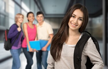 Student standing outdoor, ready for study in university