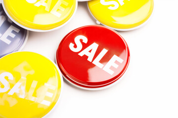 round badges with the inscription "SALE" on a white background