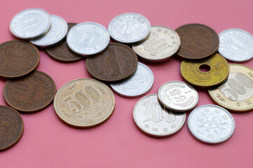 Japan money, Coins on pink background.