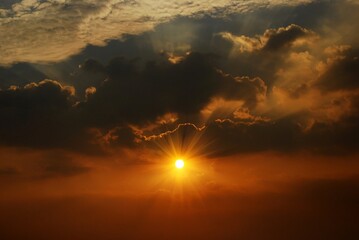 Fototapeta premium Golden sky sunrise dramatic beautiful landscape view. Dawn sky gold dusk time cloudscape with sunlight. Dramatic sunset scenic landscape. Beautiful landscape sunshine nature