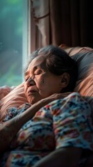 Fototapeta premium Asian old woman waking up in the morning