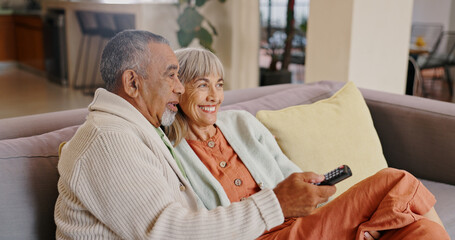 Senior couple, home and remote for watching tv with retirement and streaming movie together....