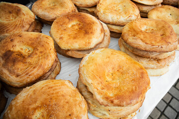 traditional Asian flatbread  on the counter  . Street bazaar