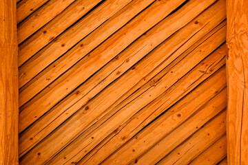 Fototapeta premium Close up of latillas, hand hewn and layered diagonally over Vigas the main structural support in the Pueblo architectural style, New Mexico 