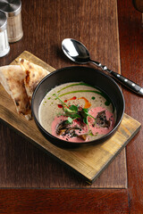 mushroom cream soup in a bowl. restaurant menu