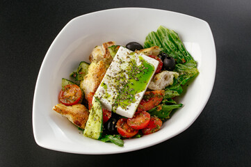 Greek salad on a plate. restaurant menu