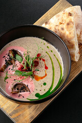 mushroom cream soup in a bowl. restaurant menu