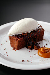 chocolate dessert with vanilla ice cream on a plate