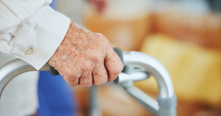 Hand, senior person and walking frame with balance, recovery and mobility exercise in house....