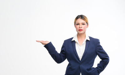 A Transgender woman in a suit strikes various business poses while being photographed in a studio with a white backdrop.