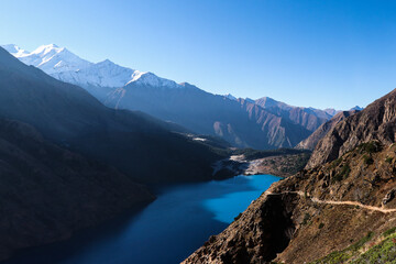 Morning view of Phoksundo Lake and the mountains ( Annapurna circuit)
