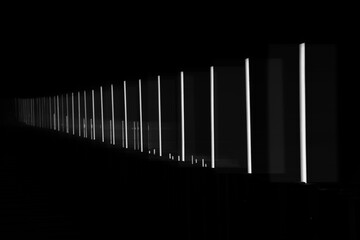 Obraz premium Fluorescent Vibrant Neon Futuristic Sci Fi Glowing white Virtual Reality Cyber Tunnel road in perspective. Floor Stage Empty Space Background design. night scene.