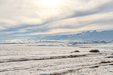 snowy Mount Aragats and Kasakh river valley scenic view from Yeghipatrush village (Aragatsotn province, Armenia)