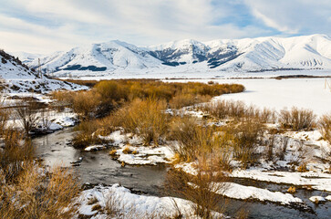 Kasakh river valley and snowy Teghenyats Mountain Range scenic view from Yeghipatrush road (Aragatsotn Province, Armenia)