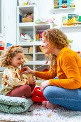 Mother listening the beat of daughter heart with fake stethoscope