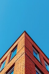 red brick building on blue sky background