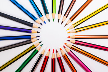 Colored pencils arranged in a circle in perspective