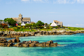 seaside church and buildings on the isle of iona