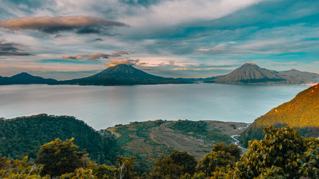 Lake Atitlan with its mountains and volcanoes during the sunrise