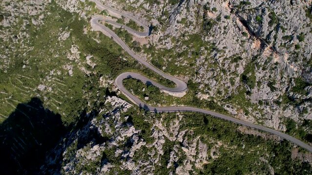 4K Aerial Drone video of mesmerizing serpentine roads in the mountains of Coll dels Reis, Nus de Sa Corbata, Mallorca