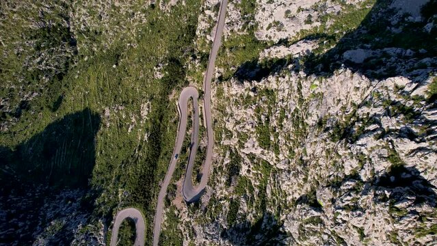 4K Aerial Drone video of mesmerizing serpentine roads in the mountains of Coll dels Reis, Nus de Sa Corbata, Mallorca