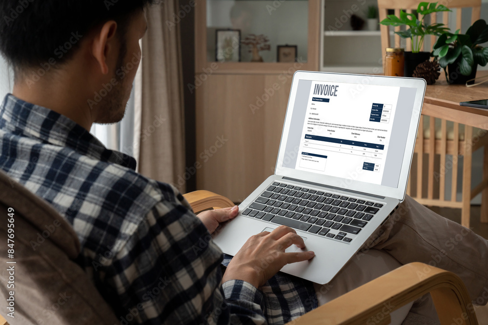 Poster invoice on computer screen from accounting application. computer program for financial and budget of