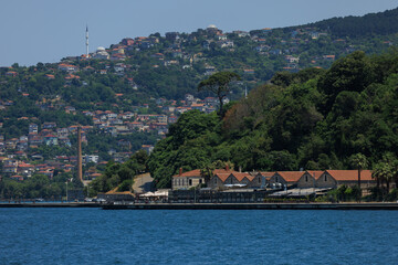 Blue seascape overlooking the coast. View of the Bosphorus in Istanbul city on sunny summer day, in a public place.