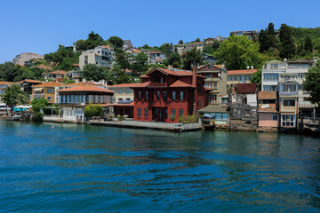 Obraz premium Blue seascape overlooking the coast. View of the Bosphorus in Istanbul city on sunny summer day, in a public place.