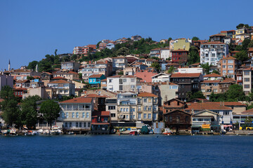 Blue seascape overlooking the coast. View of the Bosphorus in Istanbul city on sunny summer day, in a public place.