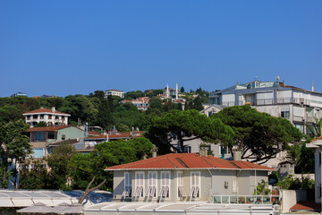 Blue seascape overlooking the coast. View of the Bosphorus in Istanbul city on sunny summer day, in a public place.