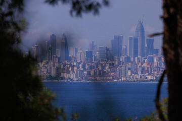 Fototapeta premium Citycape, View of the Bosphorus in Istanbul city on sunny summer day, in a public place.