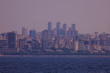 Naklejka premium Evening sea view off the coast of Istanbul. Orange sunset sky 