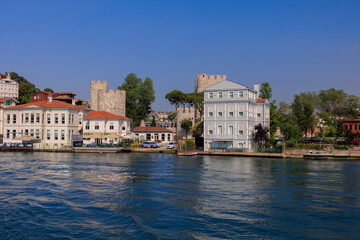 Blue seascape overlooking the coast. View of the Bosphorus in Istanbul city on sunny summer day, in a public place.