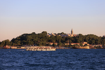 Naklejka premium Evening sea view off the coast of Istanbul. Orange sunset sky 